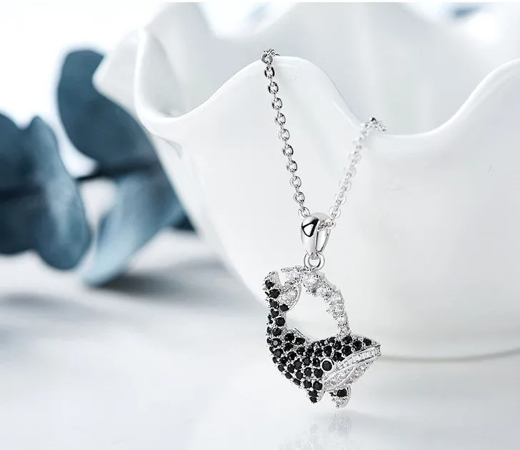 Black diamond whale necklace