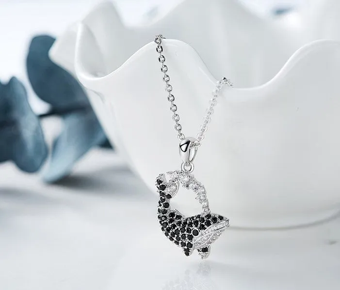 Black diamond whale necklace