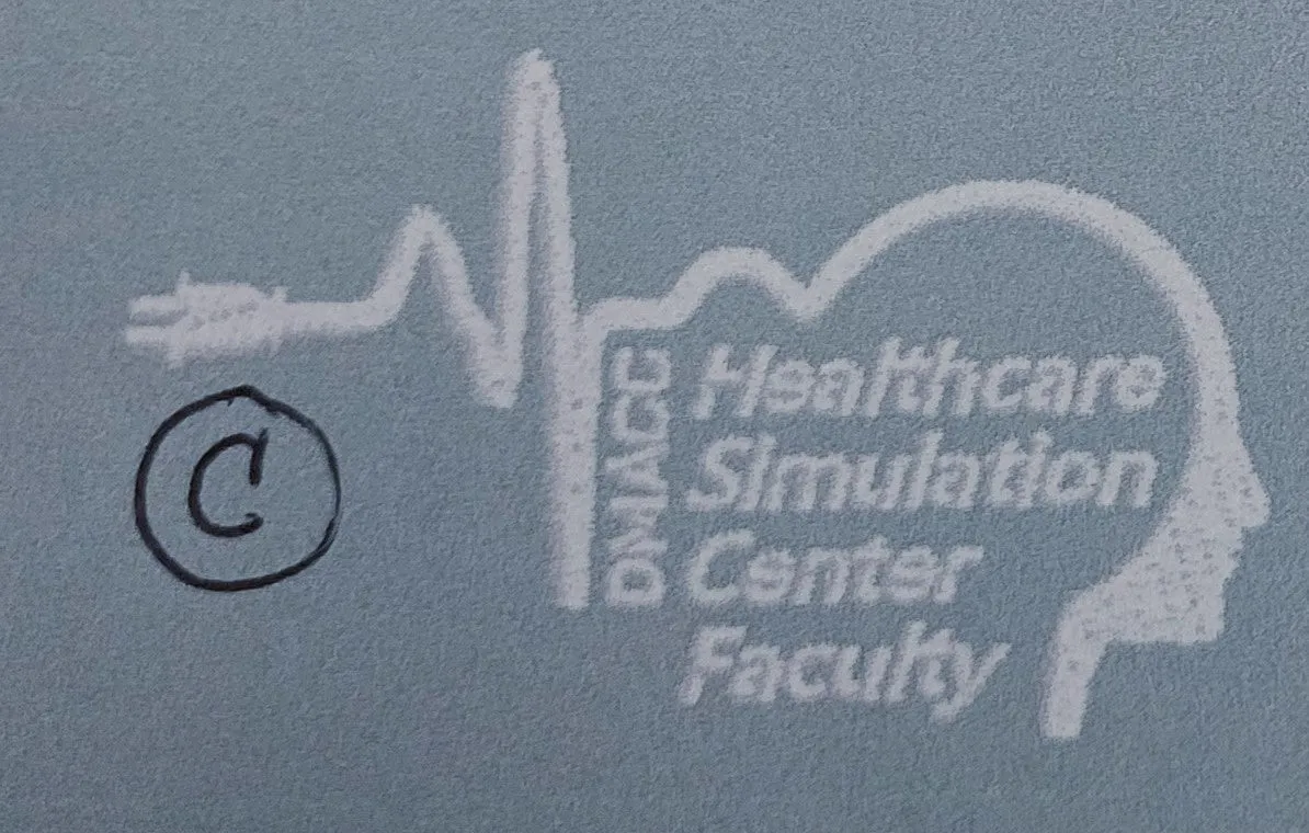 DMACC Scrubs Simulation Logo