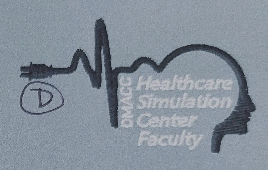 DMACC Scrubs Simulation Logo