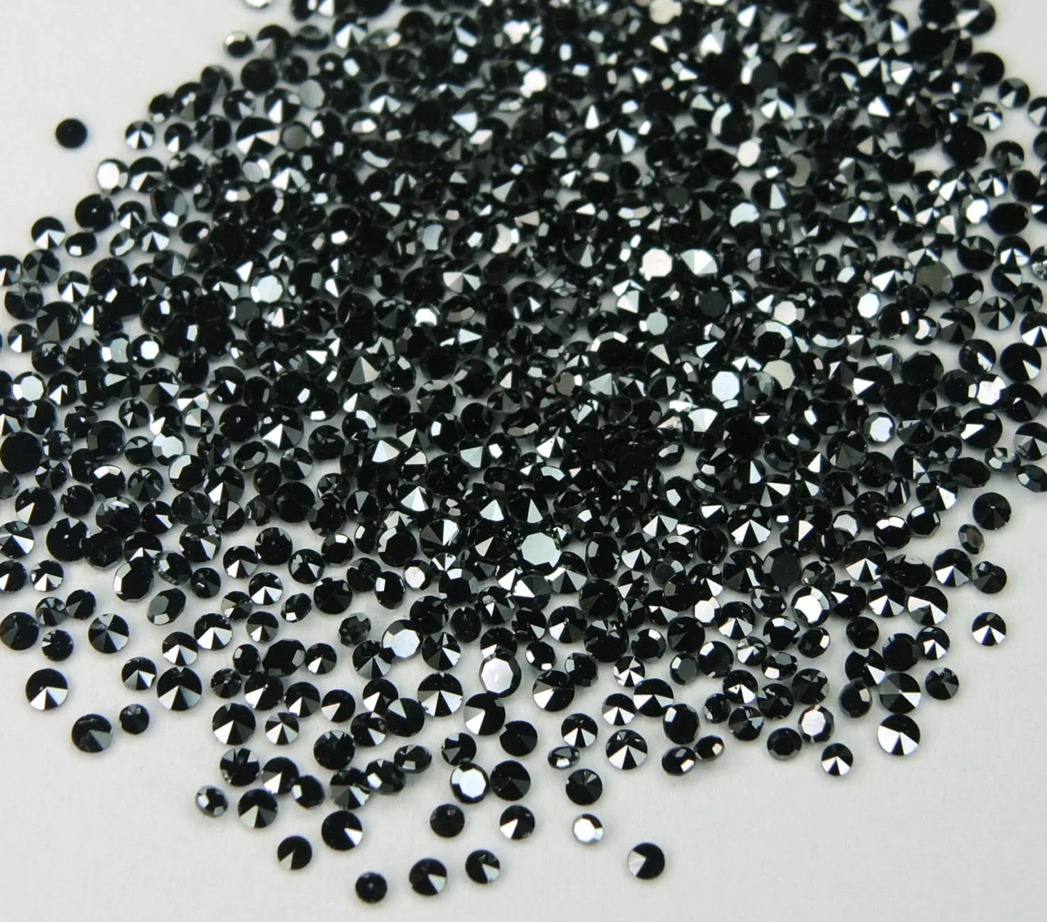 Natural black loose diamonds lot of 100pcs, round shape, single cut, 0.80 to 1.35mm in size, code Q09.