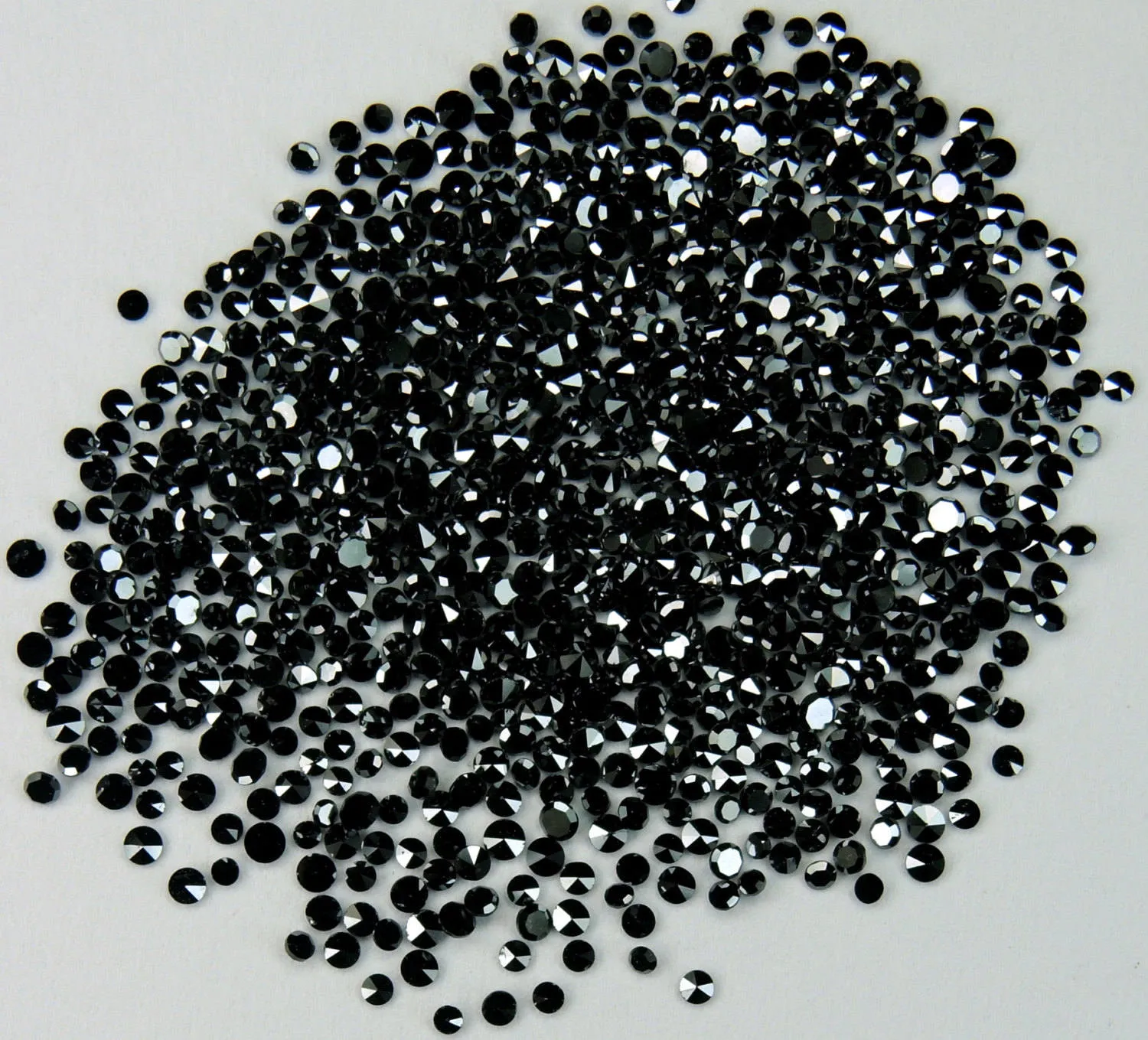 Natural black loose diamonds lot of 100pcs, round shape, single cut, 0.80 to 1.35mm in size, code Q09.