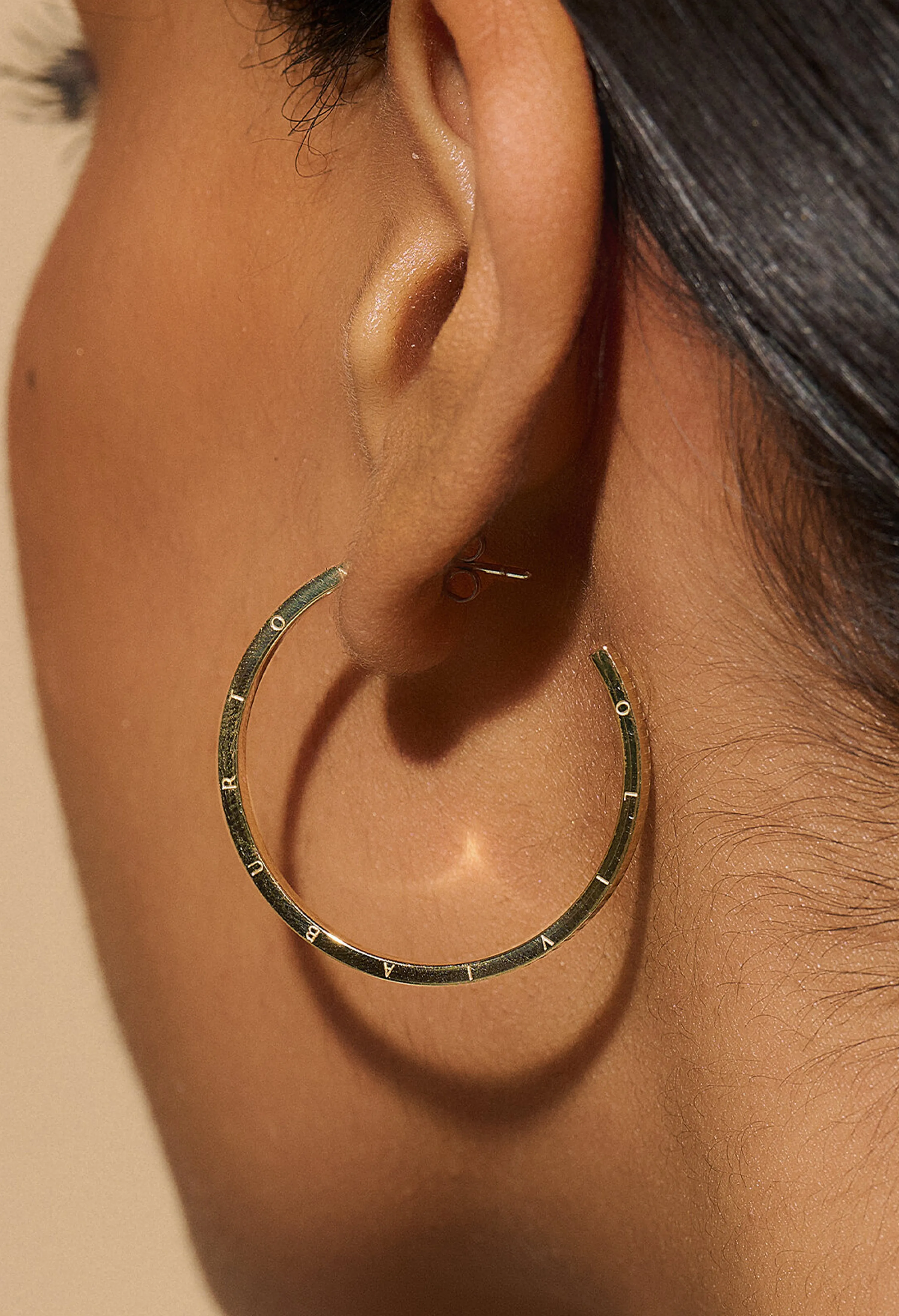 Olivia Burton Linear Hoop Earrings Gold Plated.